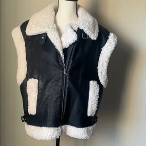 Peter Som Faux leather Black Vest fully lined in faux Sherpa . Medium